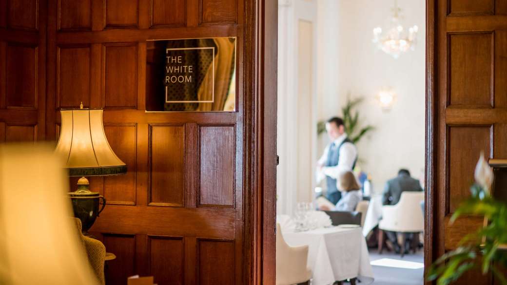 Victoria Hotel White Room Dining Area Entrance