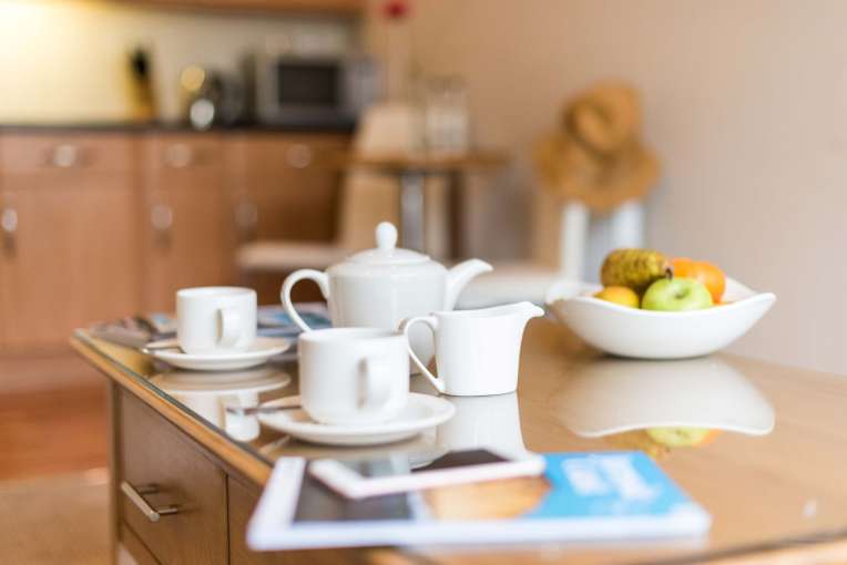 Victoria Hotel Poolside Suite Accommodation Lounge Coffee Table with Teapot