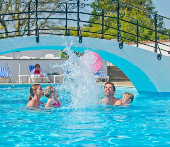 Victoria Hotel Family Enjoying Time in the Outdoor Pool