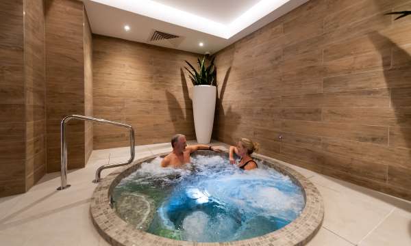 couple in spa bath 