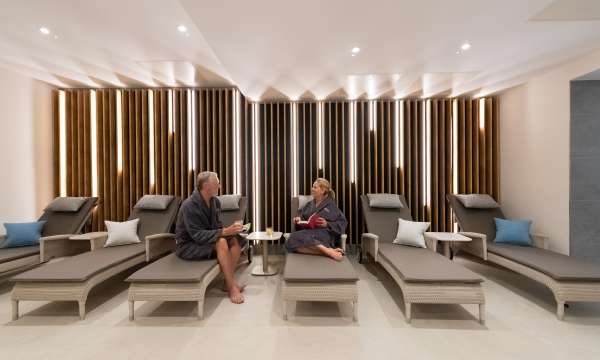 Couple talking in relaxation area 