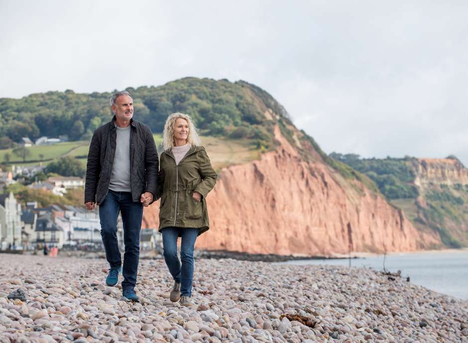 Couple Walking Along Jurassic coast