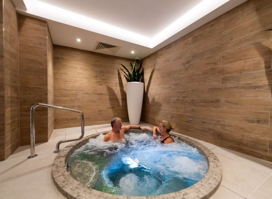 couple in spa bath 